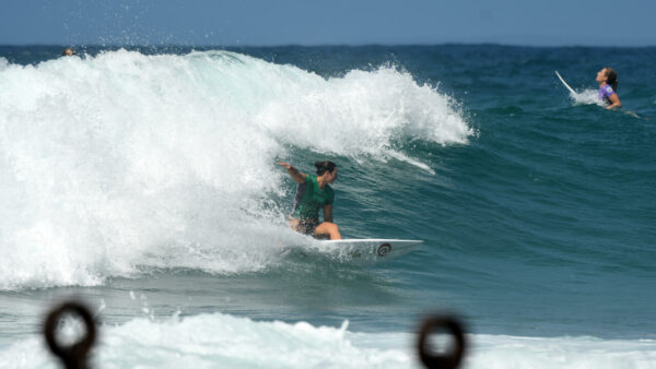 Tyler Wright surfing backside at Newcastle