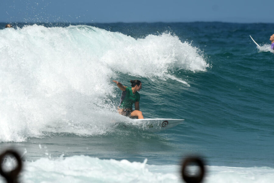 Tyler Wright surfing backside at Newcastle