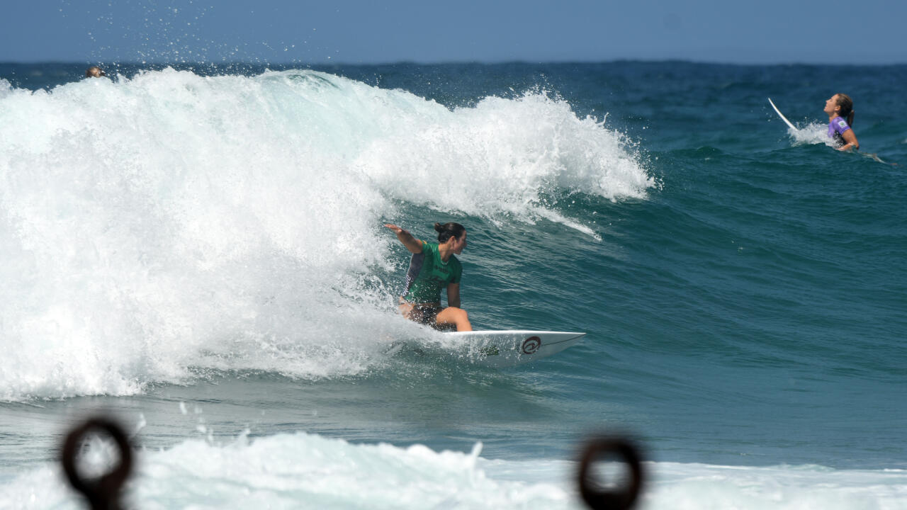 Tyler Wright surfing backside at Newcastle